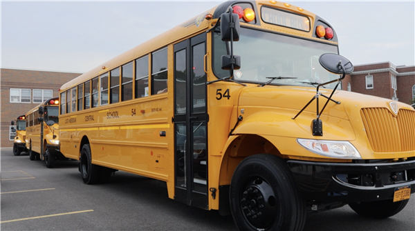 School buses lined up in front of Elementary School.